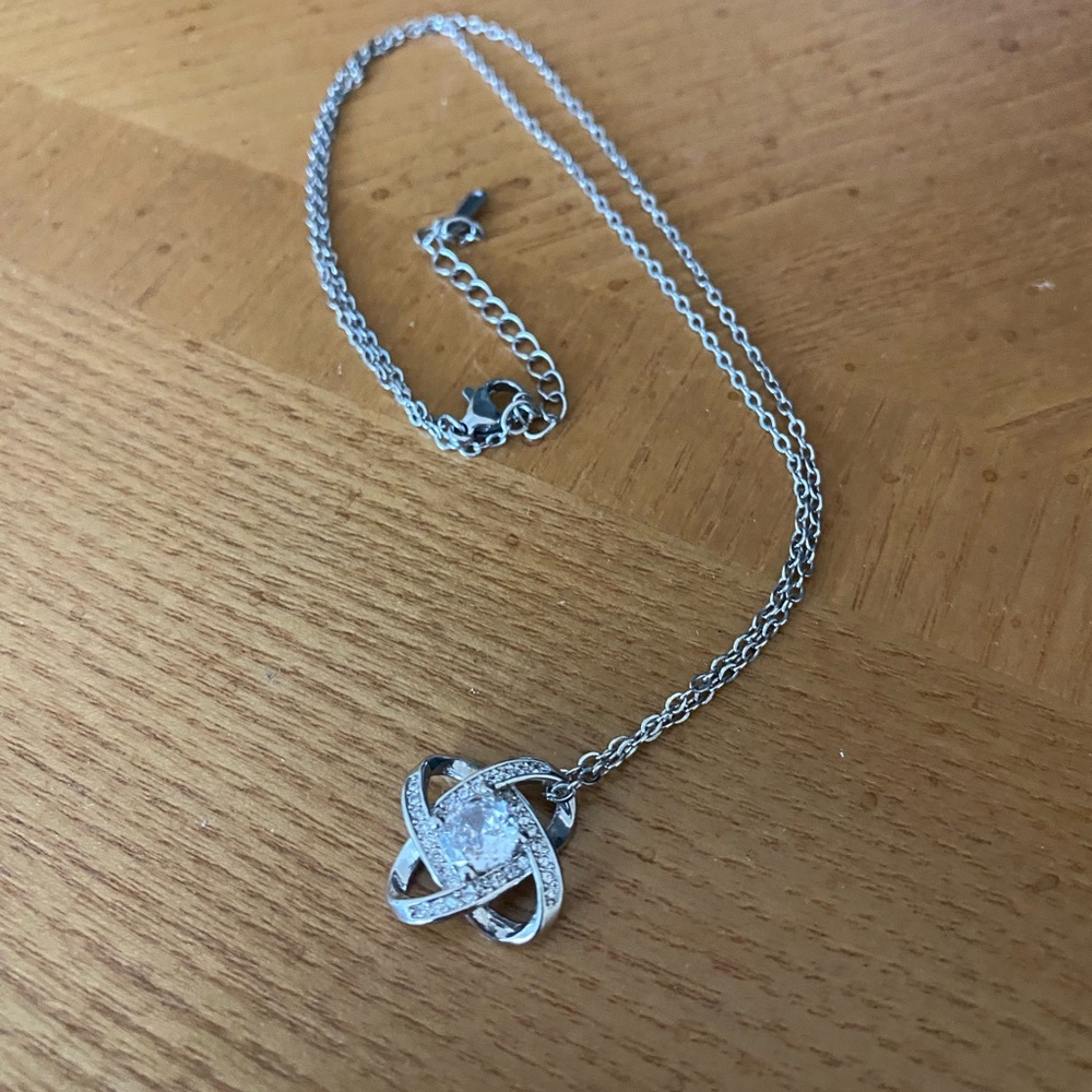 Elegant Silver Necklace with Intricate Pendant